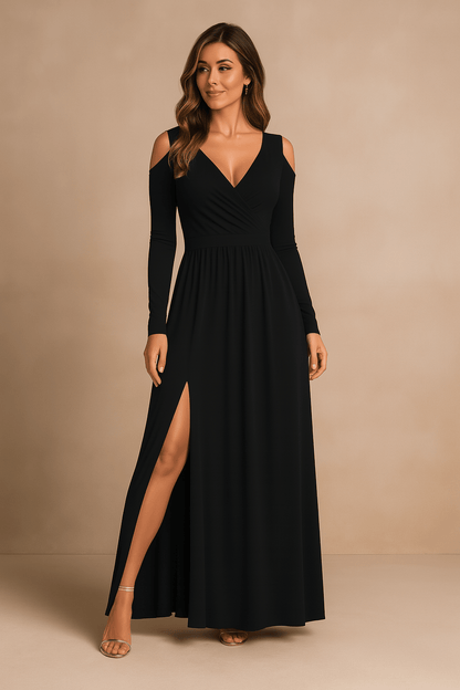 Woman wearing a black dress with a slit on a beige background