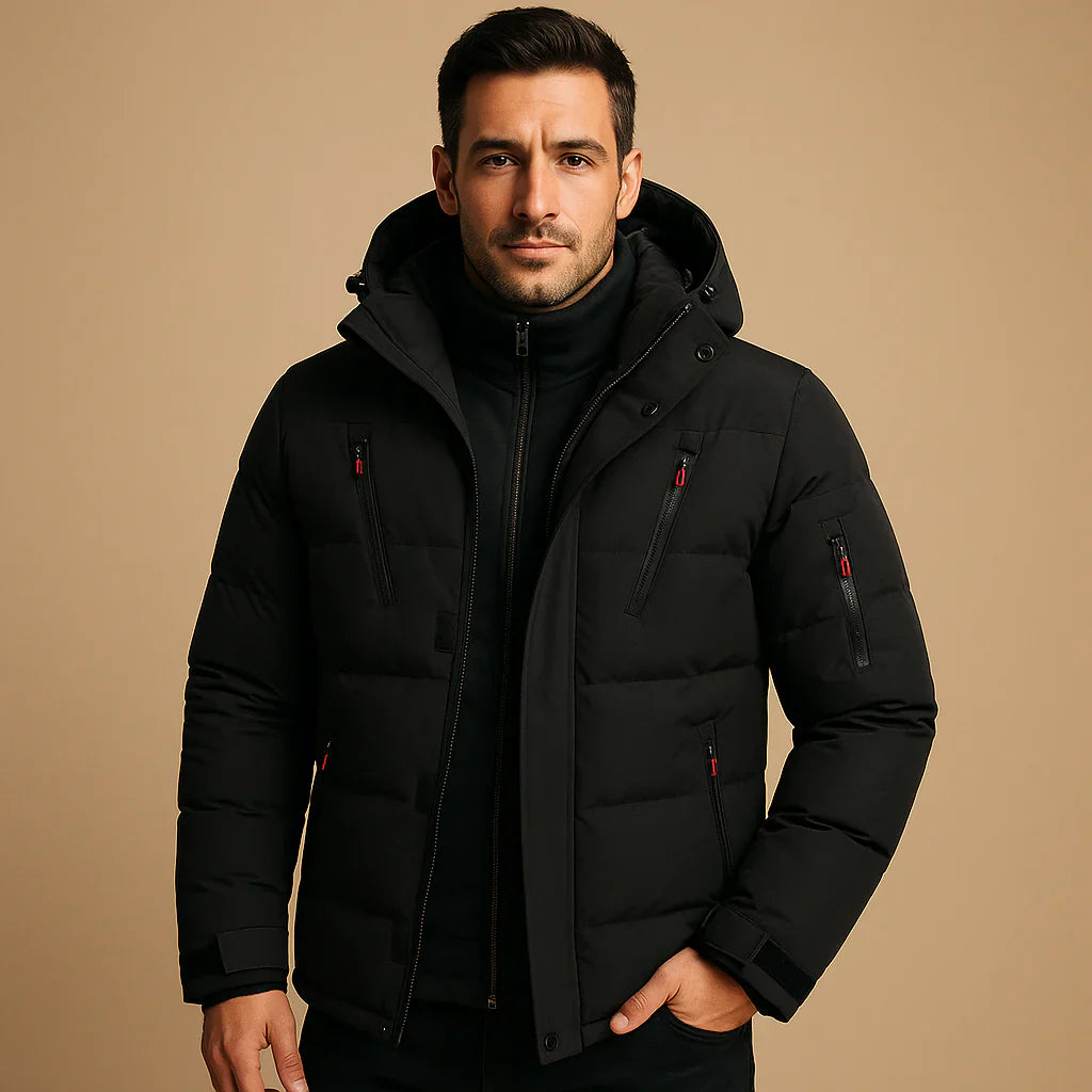 Man wearing a black puffer jacket on a beige background