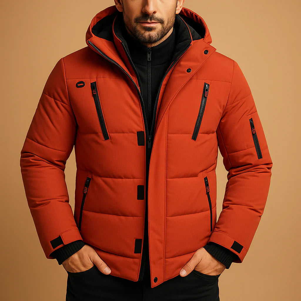 Man wearing a red puffer jacket on a beige background