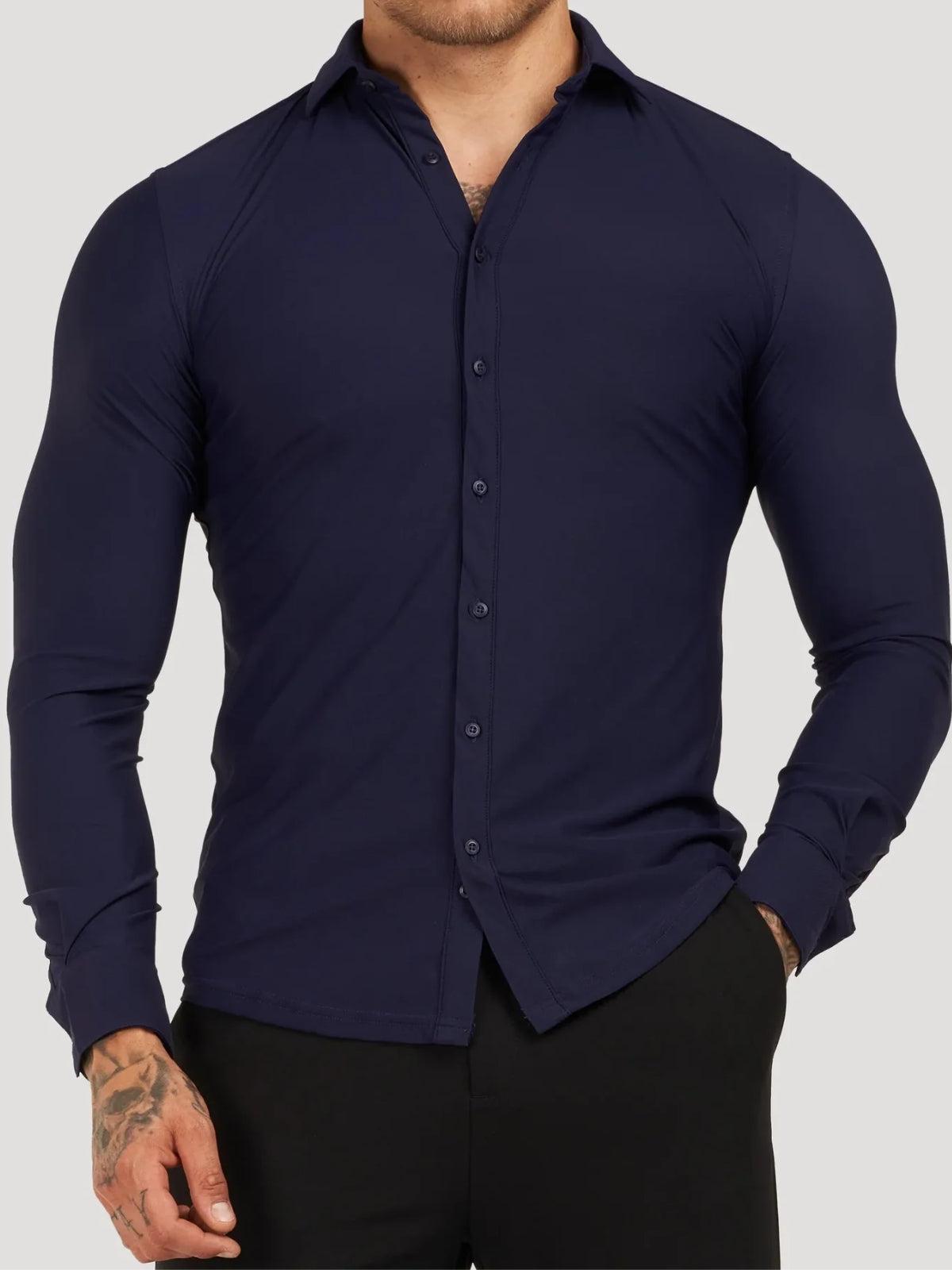 Navy blue button-up shirt worn by a person on a gray background