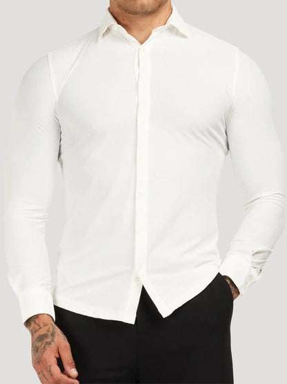White dress shirt worn by a person on a plain background