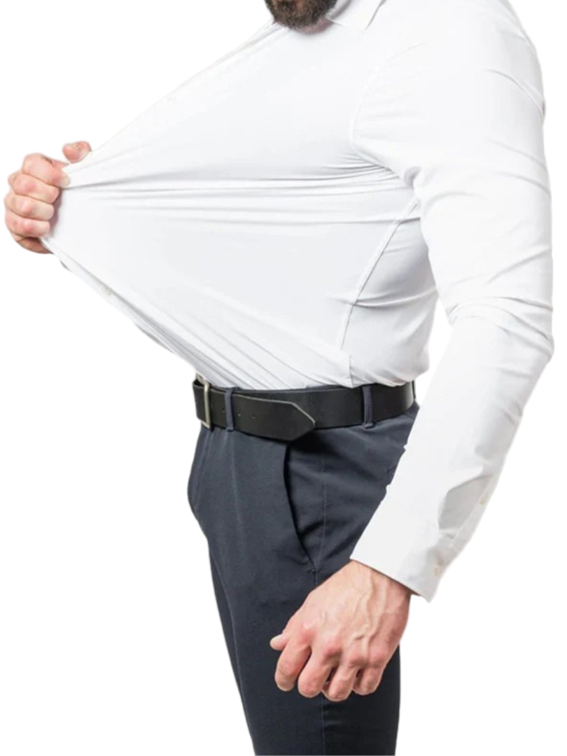 Person wearing a white shirt and gray pants with a black belt, holding the shirt open.