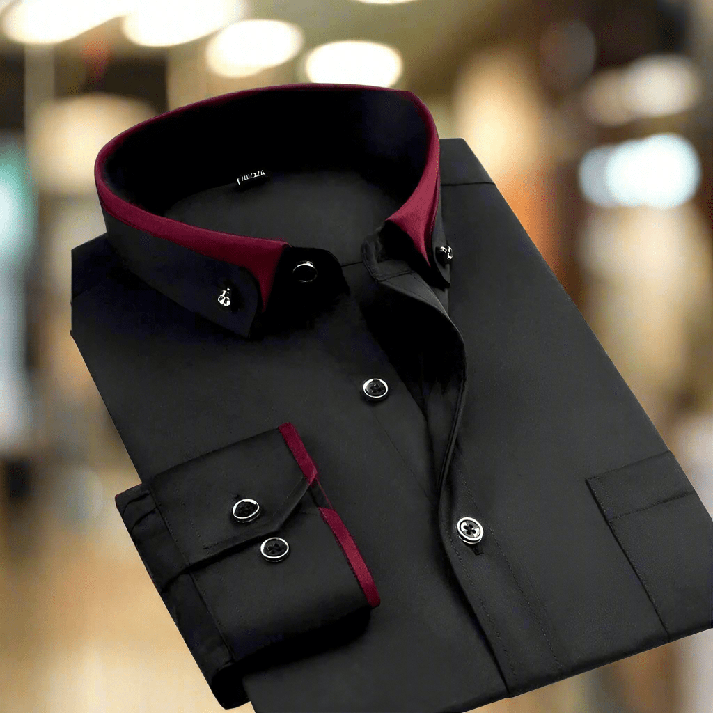 Black shirt with red collar and cuffs on a blurred background