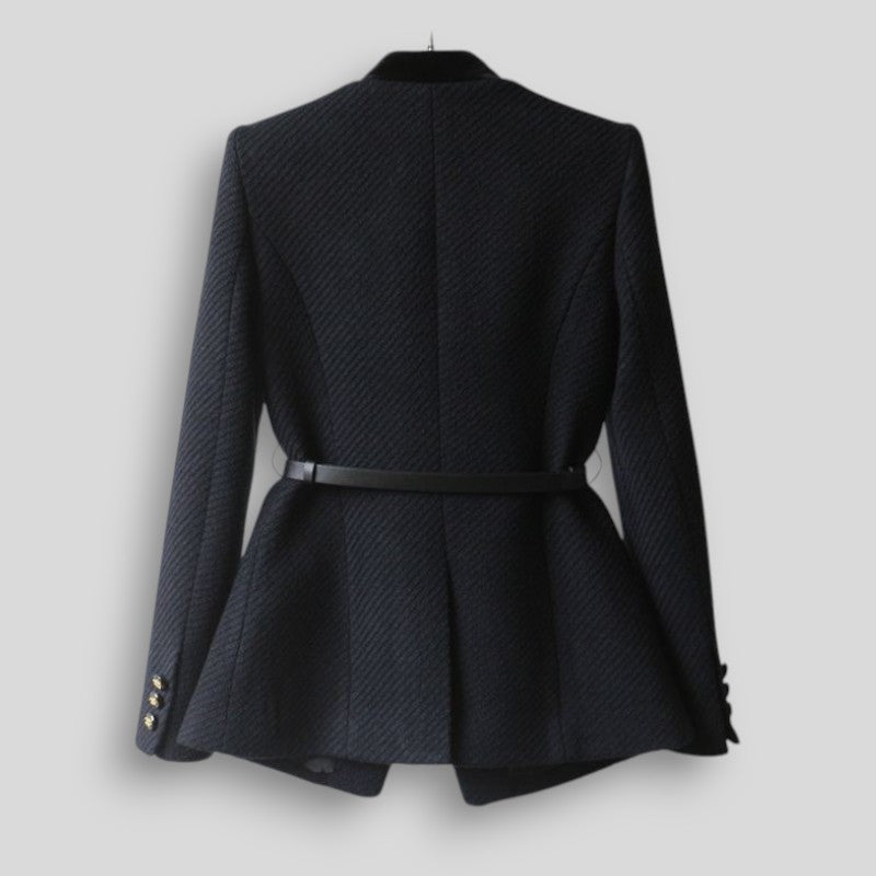 Black textured blazer on a gray background