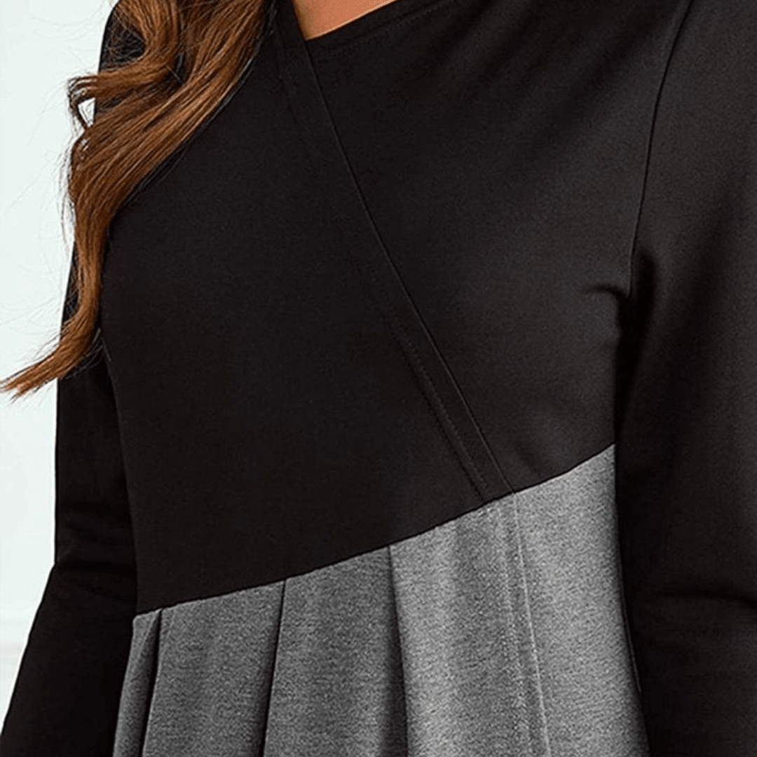 Black and gray dress with long sleeves on a white background