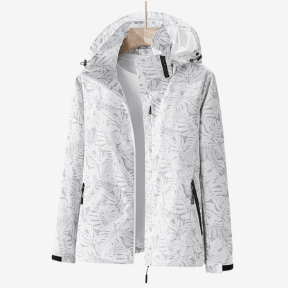 White jacket with black leaf pattern on a white background