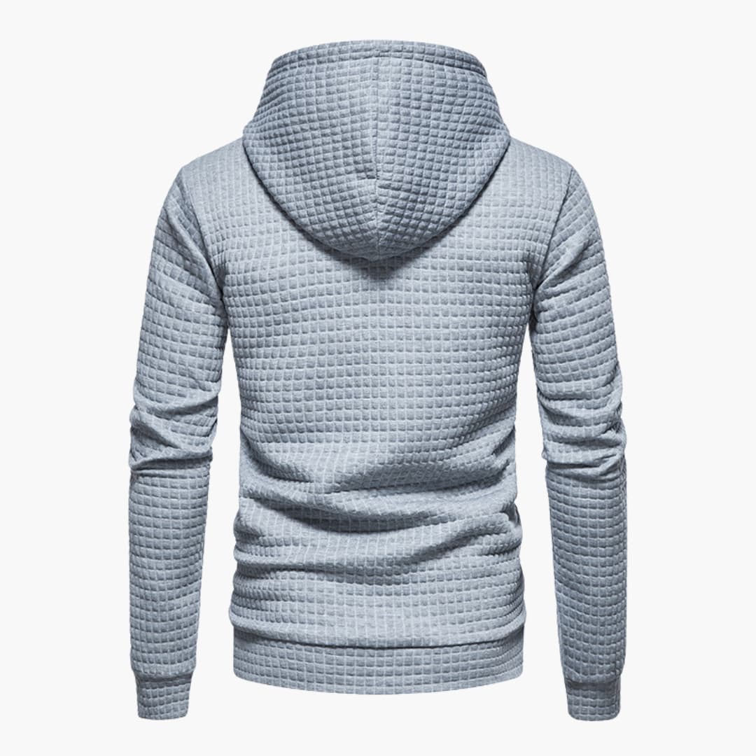 Light blue textured hoodie on a white background