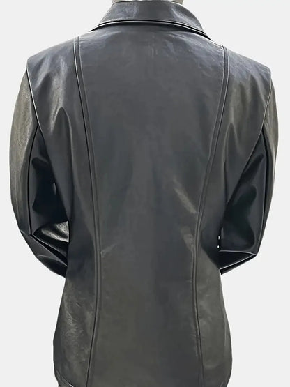 Black leather jacket on a mannequin against a white background